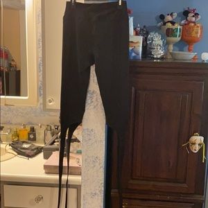 Small black wrap around the leg leggings